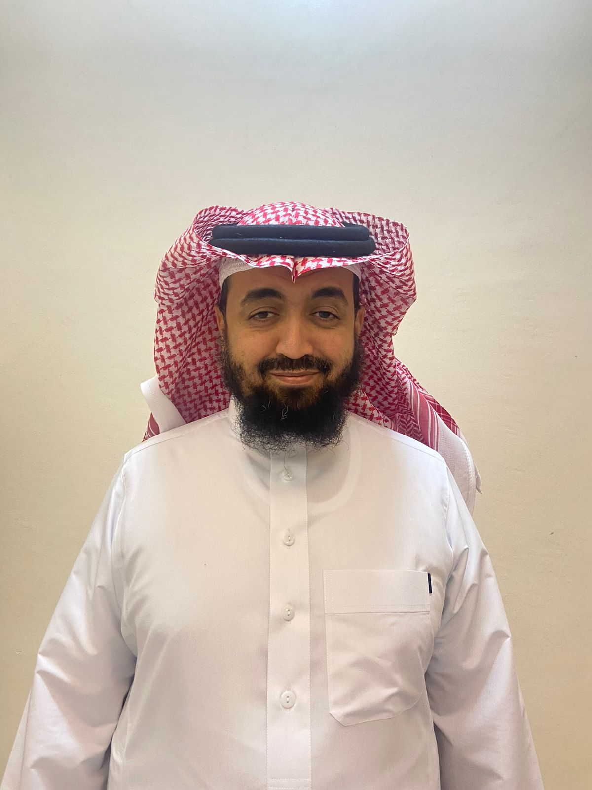 Dr. Mo'tamed bin Mohammed Al-Tayeb Al-Sharif